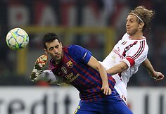 Sergio Busquetsas ir Massimo Ambrosini
