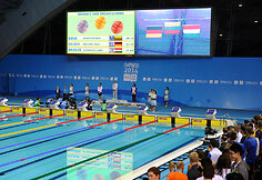 Rūta Meilutytė ant nugalėtojų pakylos
