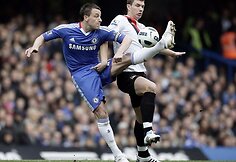 Johnas Terry ir Edinas Dzeko