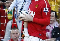 Wayne'as Rooney su savo sūnumi
