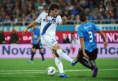 Milito (kairėje)