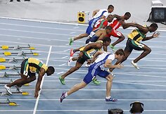 Usainas Boltas buvo diskvalifikuotas 100 metrų finale