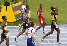 Usainas Boltas buvo diskvalifikuotas 100 metrų finale