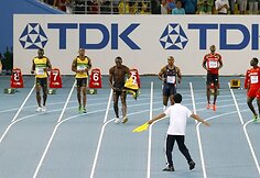 Usainas Boltas buvo diskvalifikuotas 100 metrų finale