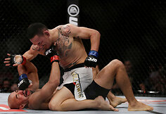 Jose Aldo ir Maxas Holloway