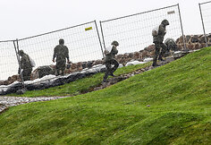 Gedimino pilies kalnas ruo&scaron;iamas liūčiai