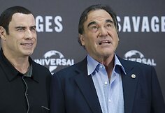 Johnas Travolta ir Oliveris Stone'as