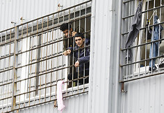 Migrantai Kybartų užsieniečių registracijos centre