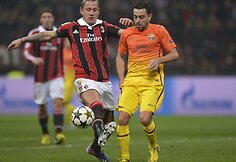 Philippe Mexes ir Xavi