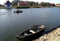 Vanduo laivus kelia ant krantinių