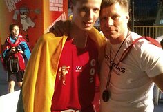 Martynas Jasiūnas ir treneris Žyrūnas Jasiūnas po pergalės pirmame etape prie&scaron; Malaizijos atstovą