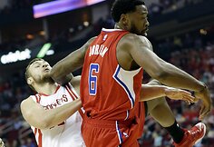 Donatas Motiejūnas ir DeAndre Jordanas