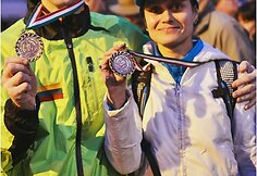 R. Karaška ir rusijos sportininkė M. Fiodorova su iškovotais medaliais.