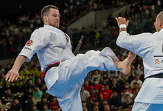 Pasaulio pilno kontakto karatė čempionato ketvirtfinalio kovų akimrka. Eventas Gužauskas