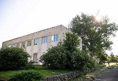 Mokykla Dieveni&scaron;kėse, kurioje planuojama apgyvendinti migrantus