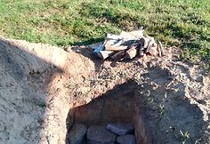 Archainiu būdu duobėje kepama mėsa