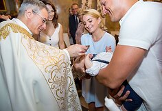 Tomo Pavilionio ir Gabrielės Lileikaitės sūnaus krik&scaron;tynų akimirka