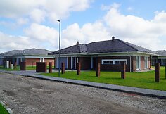 Čerpiniai stogai gyvenamųjų namų kvartale Panevėžyje