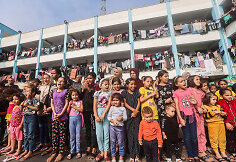 Nuo karo bėgantys palestiniečiai JT kontroliuojamoje mokykloje Chan Juanise