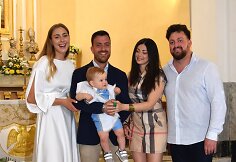 Gretos ir Federico Meschino sūnaus Santiago John krik&scaron;tynų akimirka