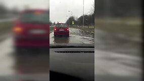 Kauno &Scaron;iaurės prospektas po lietaus virto upe