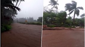 Havajai tapo milžiniška upe – po stiprių liūčių persipildžius užtvankai evakuojami žmonės