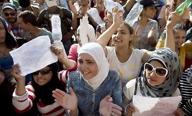 Prie Budape&scaron;to traukinių stoties protestuojantys migrantai