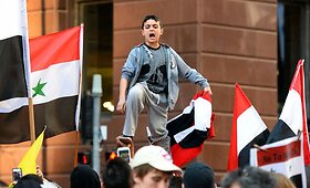 Australijoje &ndash; protestas prie&scaron; potencialius karinius smūgius Sirijai 