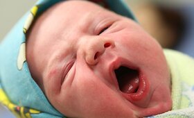 Septyniamilijardasis pasaulio žmogus, jo mama Jelena Nikolajeva ir Vladimiras Putinas