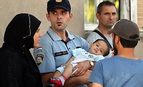 Migrantai mėgina įsėsti į traukinius prie Kroatijos sienos