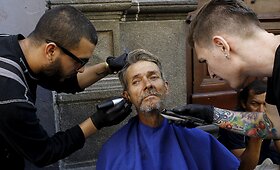 Kosta Rikoje 30 savanorių pasirūpino sostinės benamiais