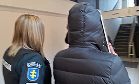 Justina Gaigalaitė i&scaron;vedama i&scaron; teismo
