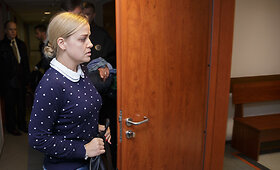 Policininkė kaltinama dangsčiusi egzekuciją surengusį kolegą