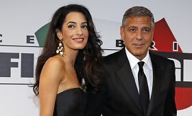 George'as Clooney su sužadėtine Amal Alamuddin ant raudonojo kilimo debiutavo kaip pora