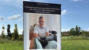 Vilniaus rajone stovintis plakatas