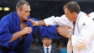 Karolis Bauža (balta apranga) ir Romainas Buffetas