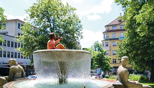 Mėgėji&scaron;kai fotografuojantis Chrisas Porszas i&scaron;leido savo kelionių nuotraukų knygą 