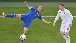 Anatolijus Timo&scaron;čiukas ir Wayne'as Rooney