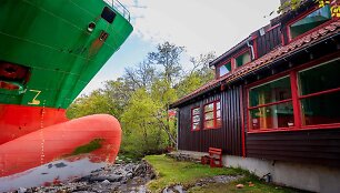 Krovininis laivas vos nekliudė norvego namo Trondheime / AFP