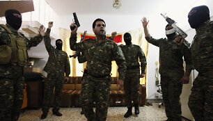 Džiugiai nusiteikę islamistai i&scaron; Irako vyksta į Siriją