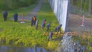 Migrantai bando patekti į Lenkiją