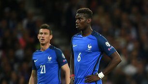 Paulis Pogba ir Laurent'as Koscielny 