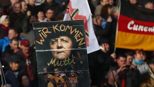 Europoje surengti prie&scaron; pabėgėlius nukreipti protestai