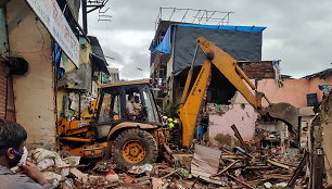 Mumbajuje sugriuvus pastatui žuvo 11 žmonių