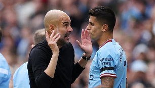 Pepas Guardiola ir Joao Cancelo