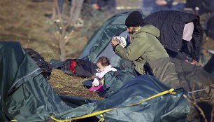 Migrantai Lenkijos pasienyje