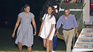 Barackas ir Michelle Obamos su dukra Malia