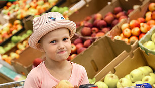 portrait-of-funny-adorable-little-girl-at-food-cou-2023-11-27-05-22-18-utc