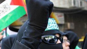 Protesto dalyvis Damaske, Sirijoje.