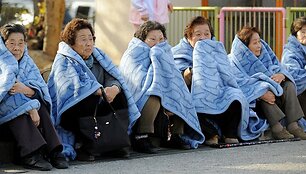 Tragedijos sukrėsti Japonijos gyventojai